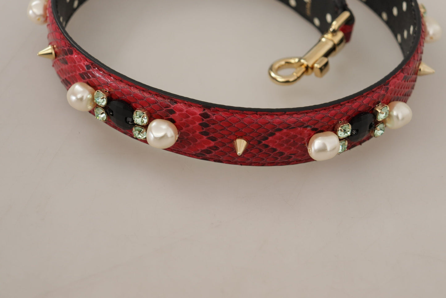 Dolce & Gabbana Schulterriemen aus Pythonleder in Rot mit goldfarbenen Details