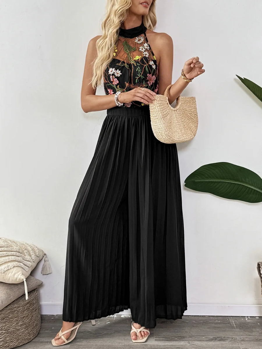 Damen Jumpsuit mit floral besticktem Halterneck