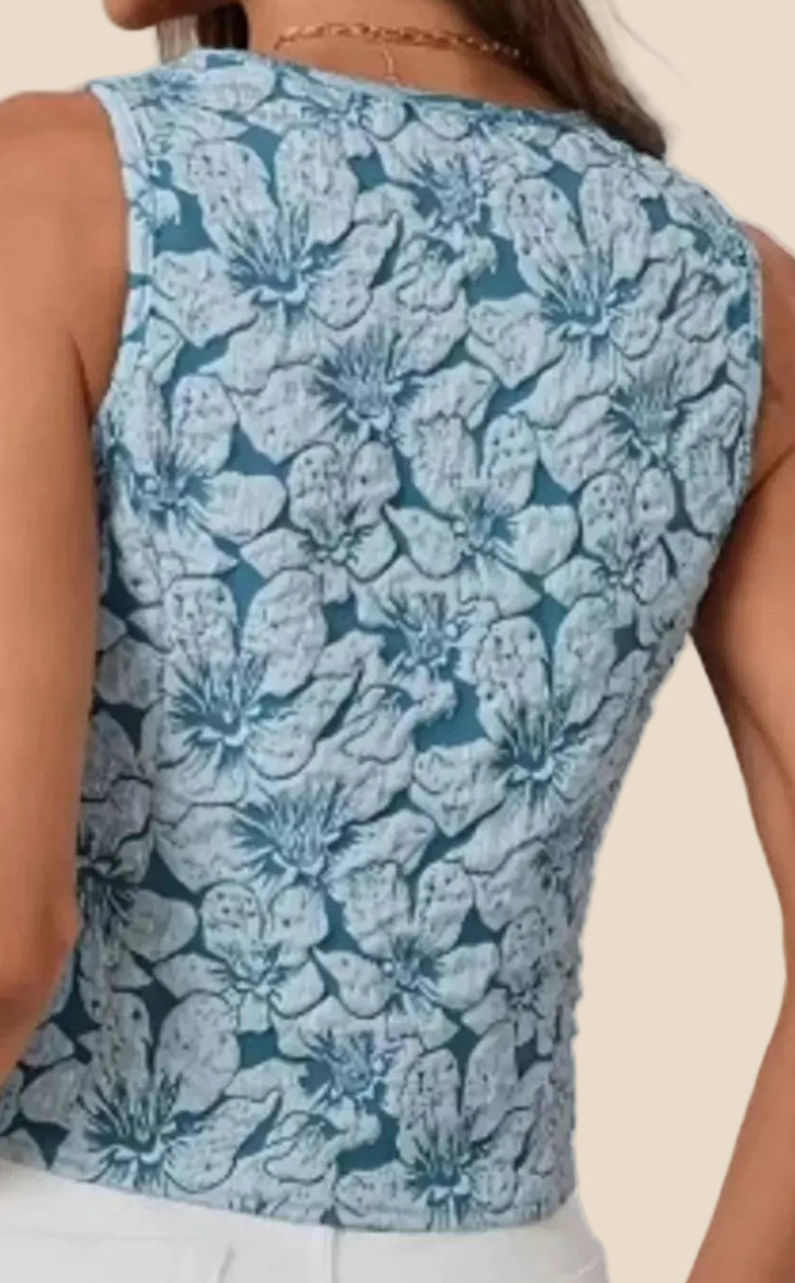 Rückansicht der ärmellosen Jacquard-Weste für Damen mit floraler Stoffstruktur