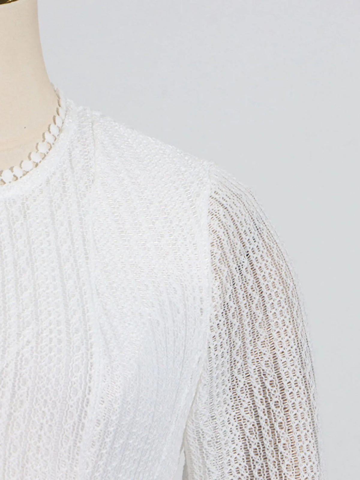 Detailansicht des Stoffes am Langarm Minikleid für Damen